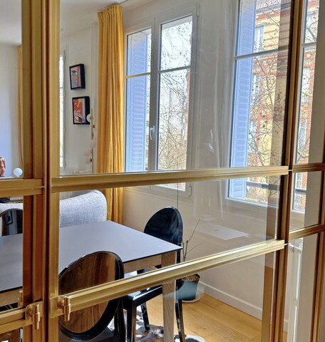 Double porte coulissante en laiton à Boulogne Billancourt