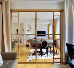 Double porte coulissante en laiton à Boulogne Billancourt