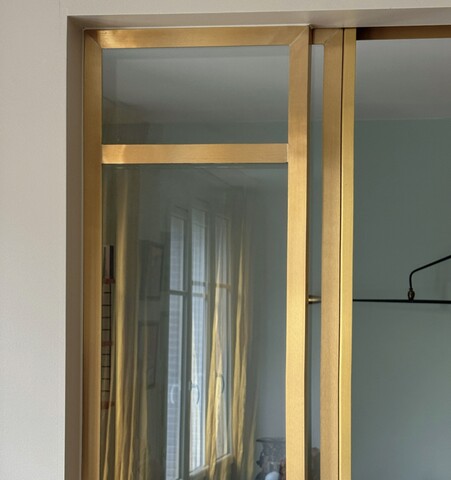 Double porte coulissante en laiton à Boulogne Billancourt