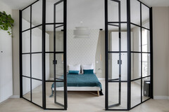 Verrière avec double porte battante style orangerie à Paris 2