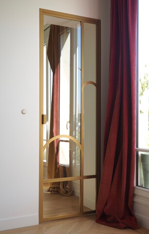 Porte battante dorée Art Déco